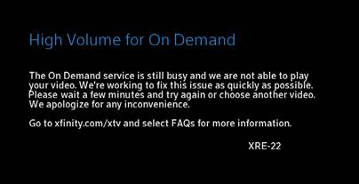 A screen message directs customers to wait a few minutes to try again or choose another video.