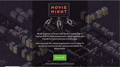 The opening page of the Movie Night App for X1 appears, with the option to press OK to begin.
